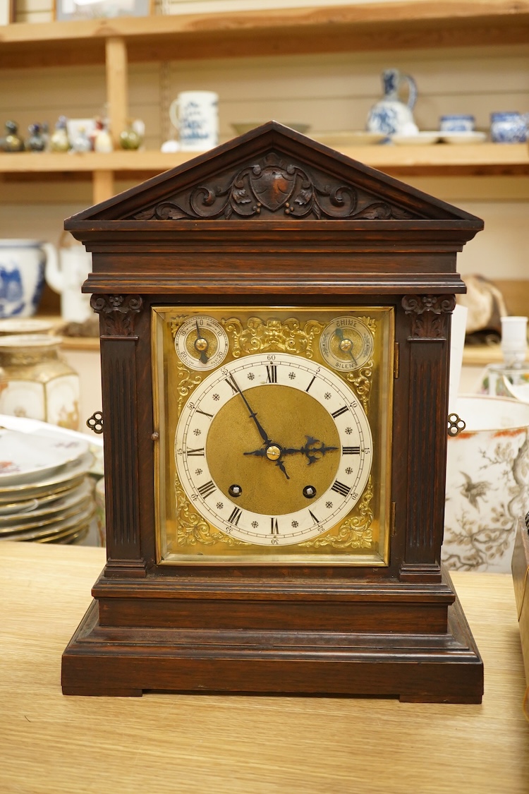 A mahogany 19th century German two train mantel clock, striking on two coiled gongs, 41cm high.